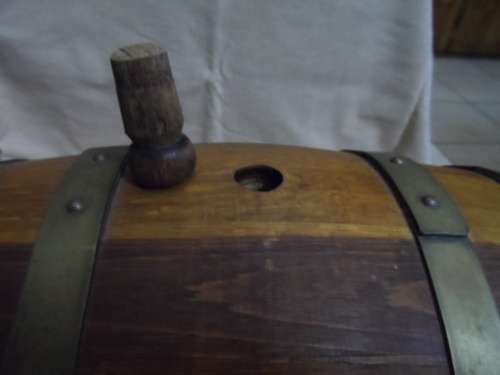 Very large oak wine barrel for a pub on a stand.    26.5 long 20cm diameter  brass tap and bands