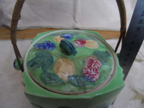 Beautiful biscuit barrel made in Japan Lid has been repaired handle good condition