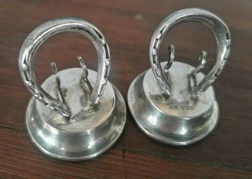 Boxed pair of hallmarked silver menu holders