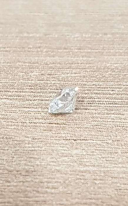 0.20Cts  DIAMOND SPARKLING E/VS2 Round Cut `Certified`