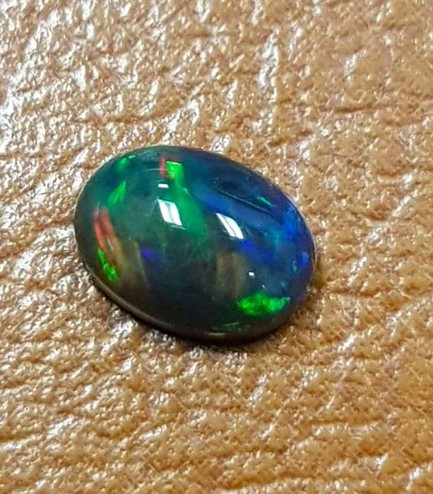 0.87Ct. Opal Oval Cabochon Multi Colours Glittering Rainbow 3D! Ethiopian Natural