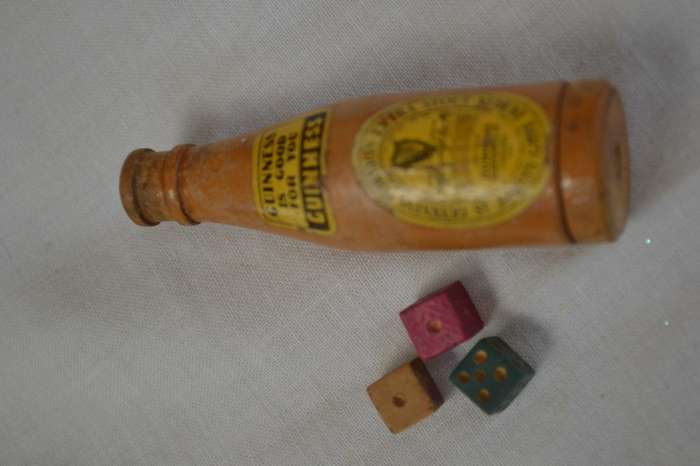7cm miniature  Guiness wooden bottle with 3 tiny die