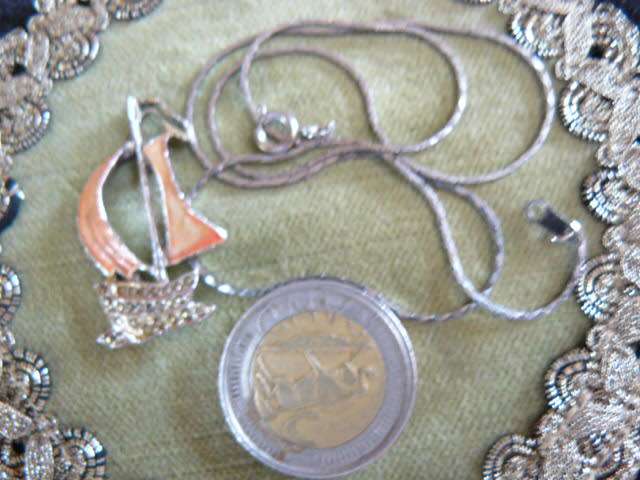 SAIL SHIP PENDANT AND SILVER TONED CHAIN