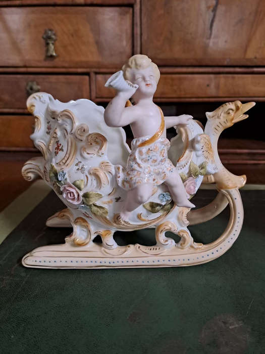 Fabulous Pair of vintage German bisque cherubs on sleighs center piece