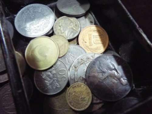 WOW.Huge hoard of coins and notes and some silver in vintage money box.