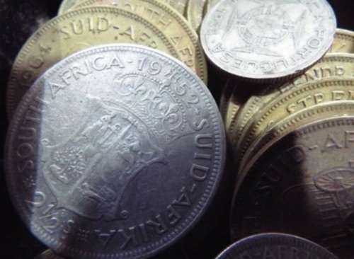 WOW.Huge hoard of coins and notes and some silver in vintage money box.