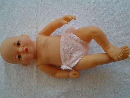 soft  rubber doll with a nappy on