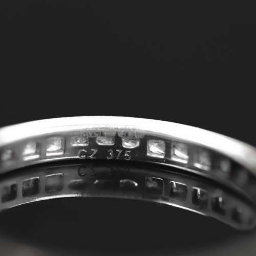 9ct  WHITE GOLD CHANNEL SET CUBIC ZIRCONIA ETERNITY RING. LONDON, ENGLAND HALLMARKED