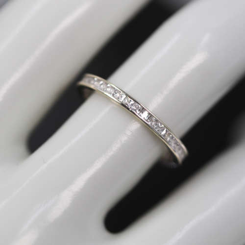 9ct  WHITE GOLD CHANNEL SET CUBIC ZIRCONIA ETERNITY RING. LONDON, ENGLAND HALLMARKED