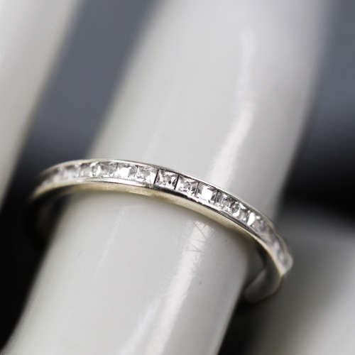 9ct  WHITE GOLD CHANNEL SET CUBIC ZIRCONIA ETERNITY RING. LONDON, ENGLAND HALLMARKED