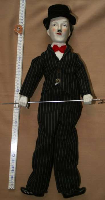 CHARLIE CHAPLIN PORCELAIN DOLL, CIRCA 1980
