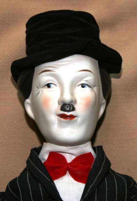 CHARLIE CHAPLIN PORCELAIN DOLL, CIRCA 1980