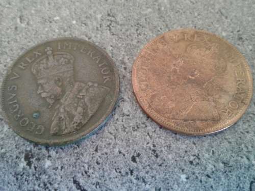 1929 and 1930 Union of SA pennies.