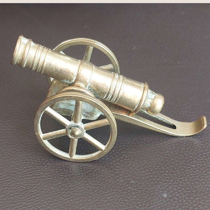 Small beautifully made brass plated cannon with wheels and rammer
