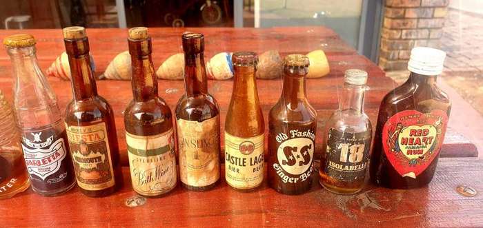 LOT OF VINTAGE MINIATURE BOTTLES MANY WITH CONTENTS