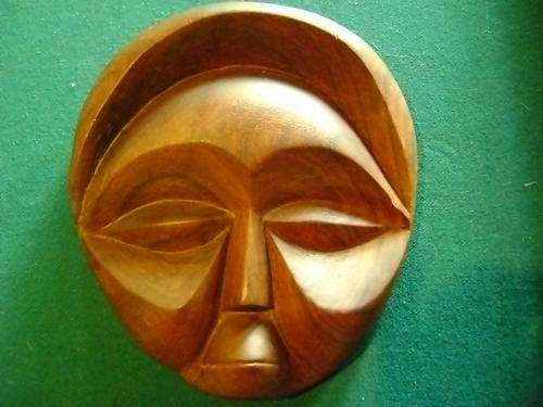 40 YEAR OLD CARVED FACES FROM OLD SUIDWES