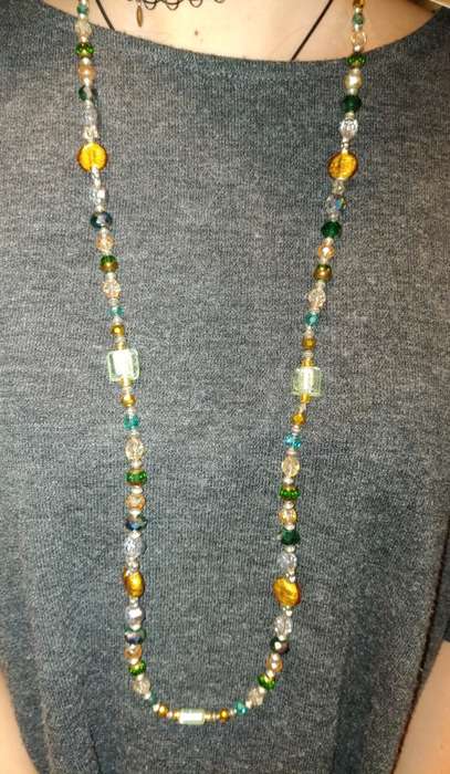 Beautiful long beaded necklace in greens and golds. LN4