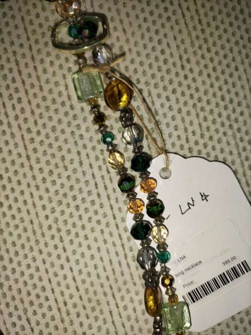 Beautiful long beaded necklace in greens and golds. LN4