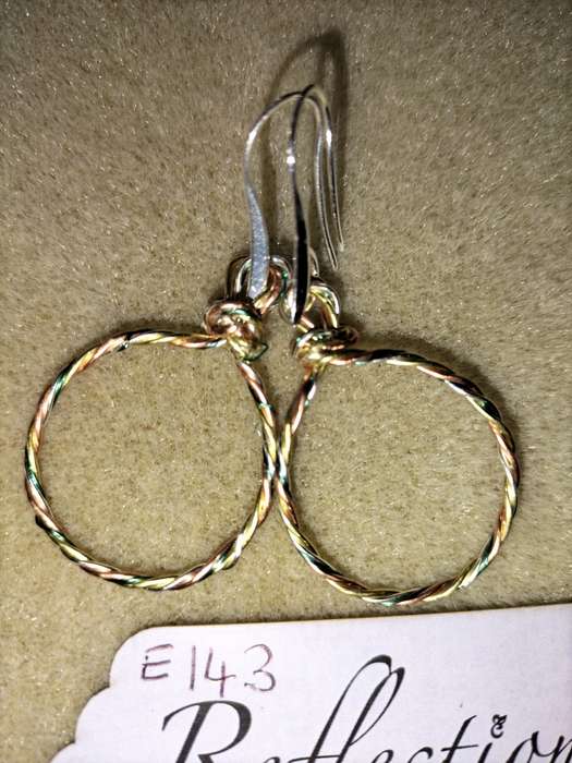 Mixed pl metal twisted 25mm hoops. E143