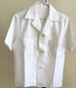 Safari style white jackets with pockets with buttons