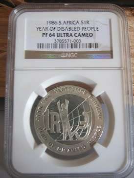1986 Year of the disabled NGC Graded PF64 Ultra Cameo silver R1