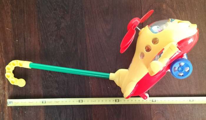 Push-a-long toy plastic helicopter