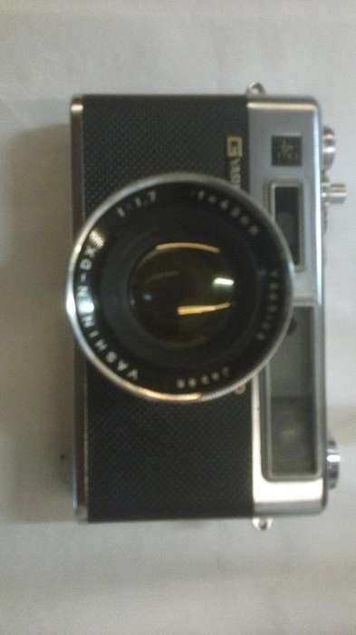 Yashica Electra 35mm Camera with original leather casing and carry strap