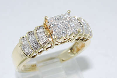 R38900 - .67CT OUT OF THIS WORLD BAGUETTE & PRINCESS CUT CLUSTER DIAMOND RING