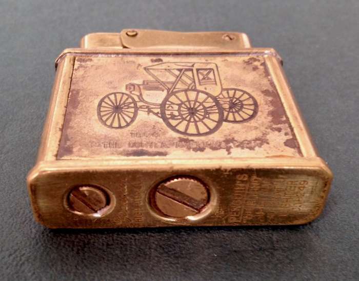 Vintage brass Penguin "Whirlwind" Lighter commemorating The Duryea - America's First, 1896.