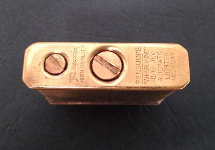 Vintage brass Penguin "Whirlwind" Lighter commemorating The Duryea - America's First, 1896.