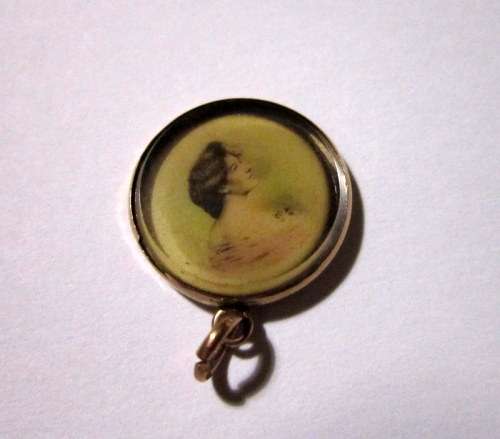 9 Carat gold fob watch charm with a lovely image of a Victorian lady