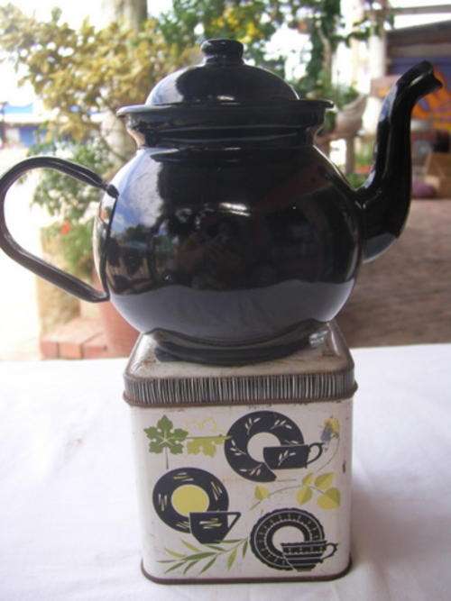 LITTLE BLACK POLISH ENAMEL TEAPOT AND RETRO TEA-TIN