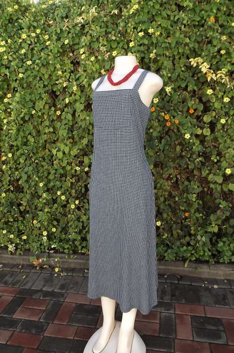Practical navy and white checked dress by Foshini size 36/12. Kangeroo  pocket on front.