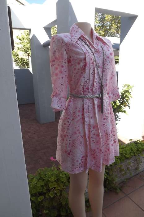 Show stopping dress in raw silk blend.Medley of pink colours.Size 36/12.New condition