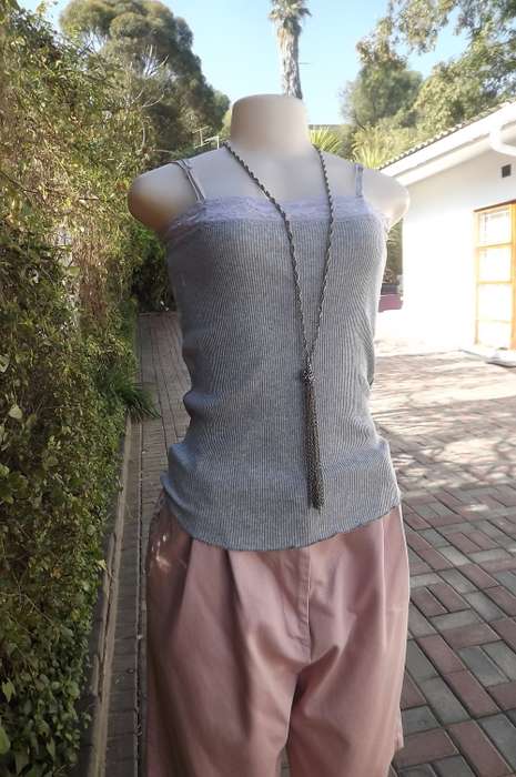 Grey 100% stretch cotton ribbed top with adjustable shoulder straps.Size 34/10.Made in Thailand