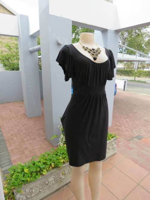 Pretty black dress in blend of polyester,viscose,rayon and spandex by 'AUDACITY' in 33/9.Good cond.