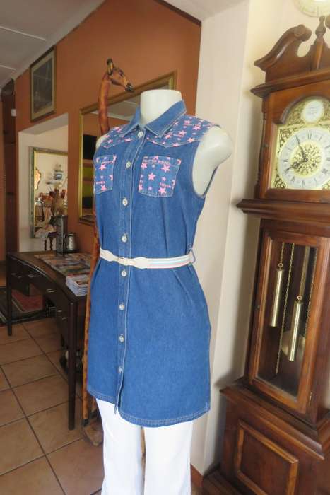 Tunic style long blue button down denim top by FAMILY PLOT in size 32/8.New cond.