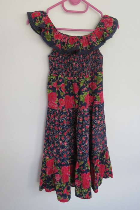 Cheeky little tiered bottom dress in navy with pink/red flowers Top elasticated. For 8 to 9 year