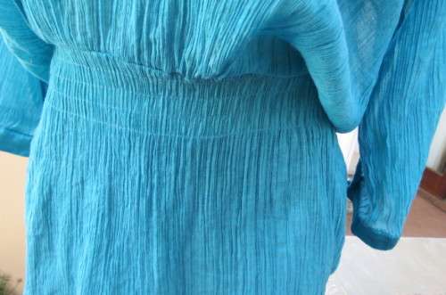 Long jade colour vertically creased with wide elasticated waist size 40/16 by 'Ella'.