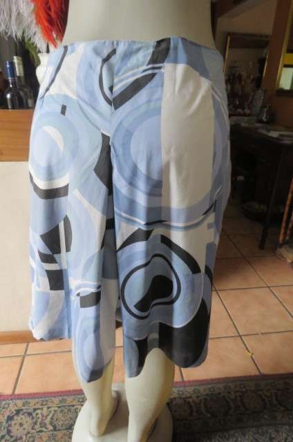 Geometric printed kneelength skirt in blues,cream and black by JEEP in size 42/18