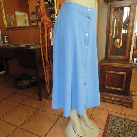 Sapphire blue button down vintage skirt by FASHIONETTE in size 36/12.Elasticated waist back.