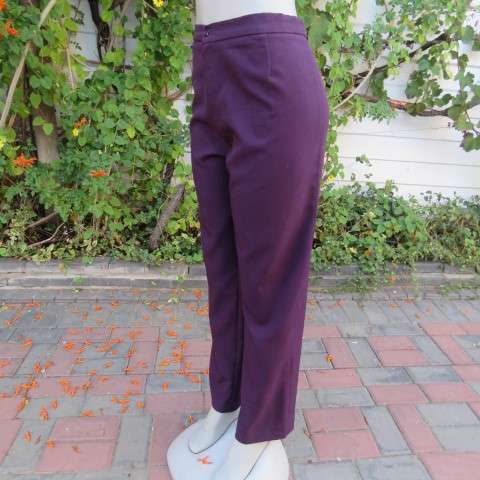 Smart dark plum colour dress pants. Zip on front size 40/16. Legs a bit tapered. As new.