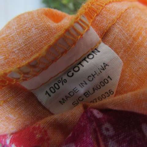 Cheerful yoked skirt in orange with gathered wide bottom size 40/16. Sequined border.New condition.