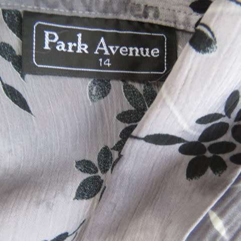Silver and darker grey coloured long sleeve top with black and white floral pattern, Size 42/18