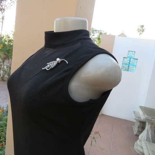 The little black dress! Size 34/10 by IQ Smart clothes.Stretch textured polyester.New condition.
