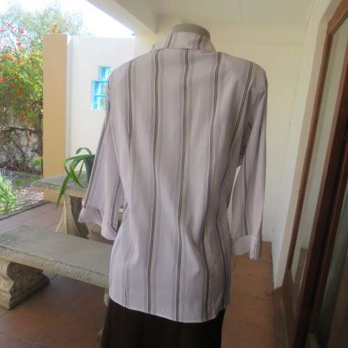 White extra long top with brown,mustard and white embossed vertical stripes. Size 42/18 by PRIMA.