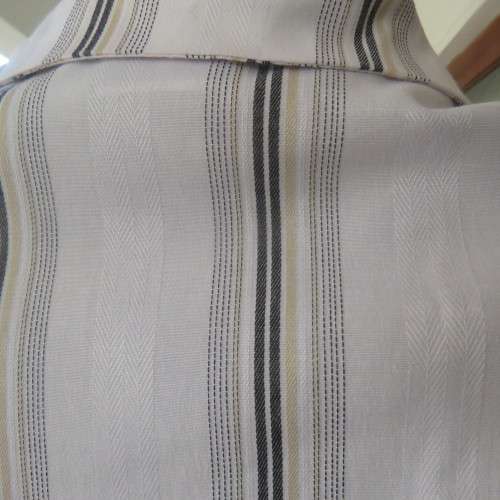 White extra long top with brown,mustard and white embossed vertical stripes. Size 42/18 by PRIMA.