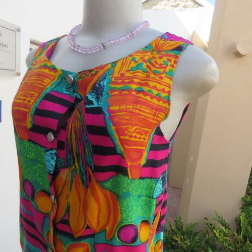 long sleeveless button down top