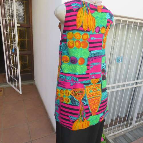 long sleeveless button down top