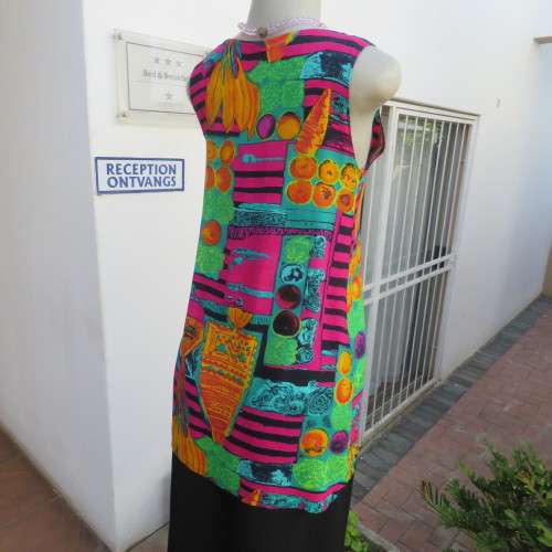 long sleeveless button down top